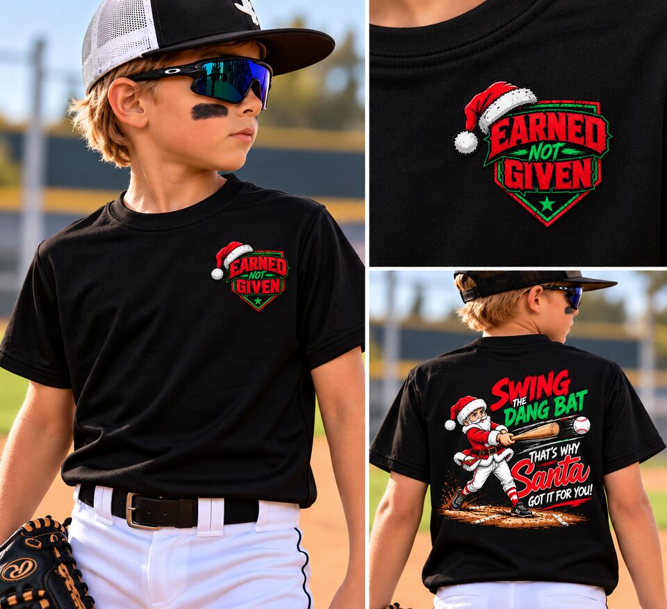 A young player in the black Swing The Dang Bat tee, front, back and the Santa hat crest